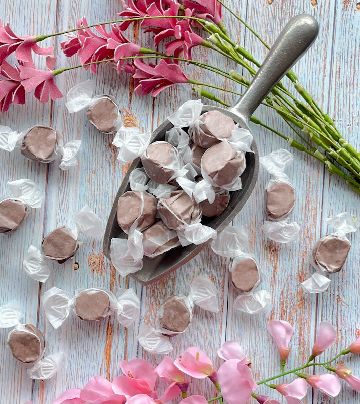 Chocolate flavored taffy that is dark brown in color