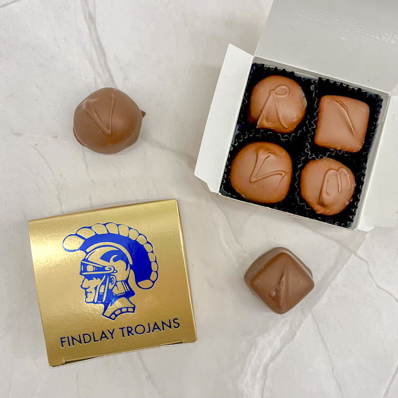 Gold four piece box featuring a blue trojan head and blue text "FINDLAY TROJANS" underneath.