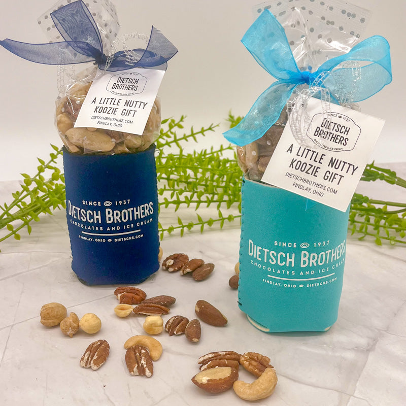 Dark blue and light blue koozie with white Dietsch Brothers logo, filled with assorted nuts
