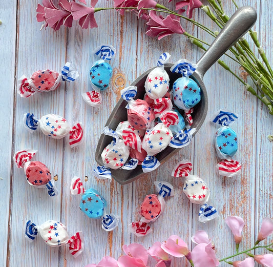 All American taffy featuring a red piece, white piece, and blue piece, all in patriotic wrappers
