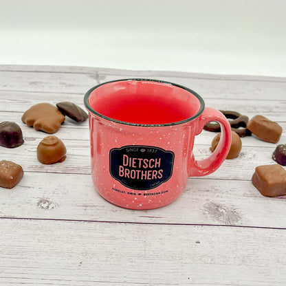 Black spotted coral mug with black Dietsch Brothers logo