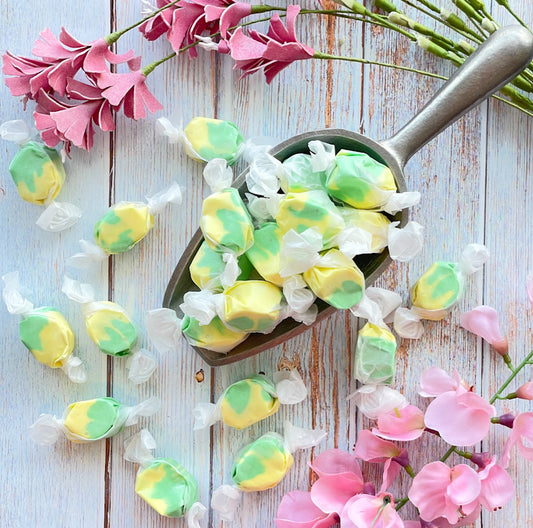 Pear taffy that features a combination of yellow and bright green colors mixed together.