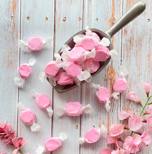 Strawberry taffy that features a solid light pink color.