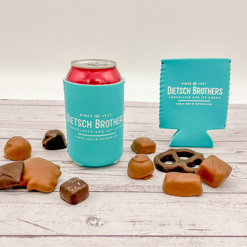 Magnetic teal koozie with white Dietsch Brothers logo