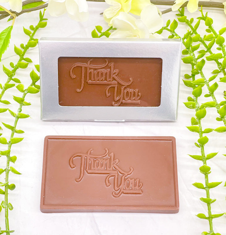 Milk chocolate bar that features a raised "Thank You" across it